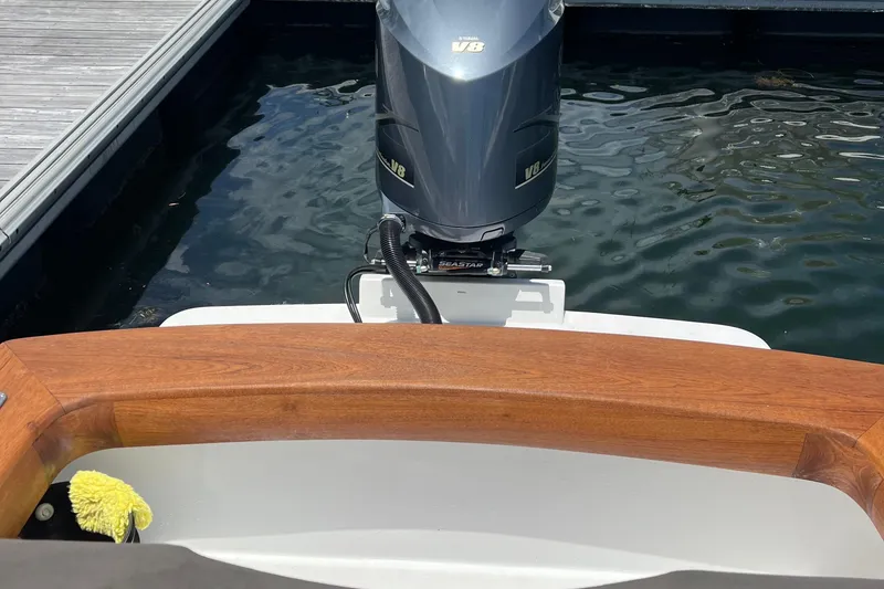Slide: The Image of 2018 Jarrett Bay Center Console boat with Yamaha V8 engine at dock. - 4