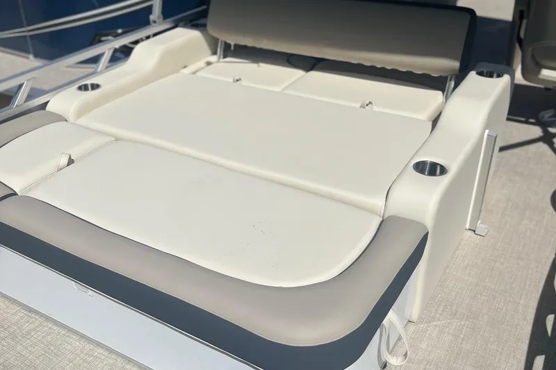 Slide: The Image of Luxurious seating on 2026 Avalon 25 LSZ VRB boat with cup holders. - 3