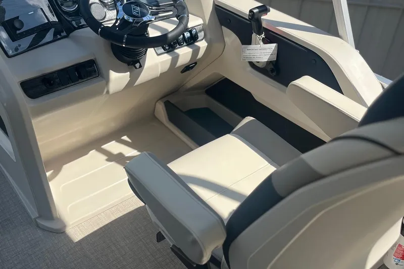 Slide: The Image of 2026 Avalon 25 LSZ VRB boat interior with steering wheel and seating. - 5