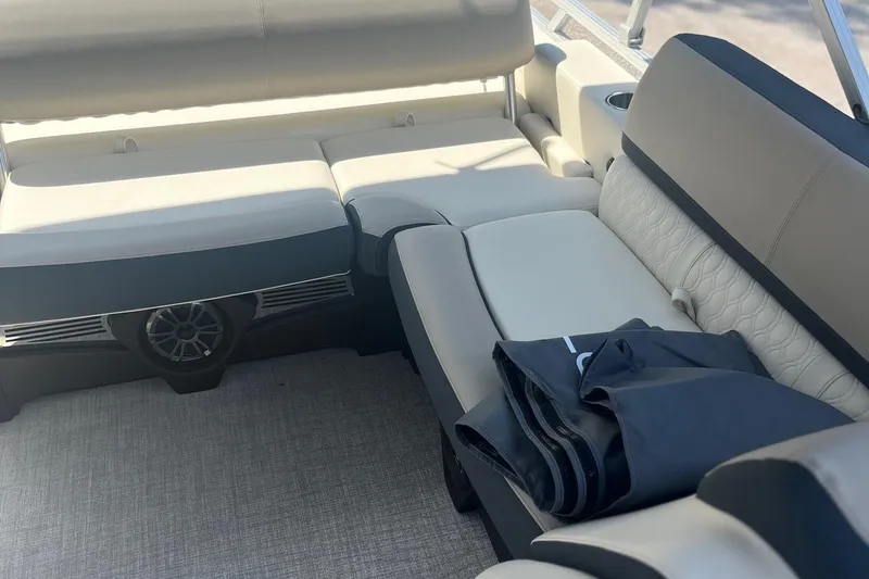 Slide: The Image of Luxurious seating on 2026 Avalon 25 LSZ VRB pontoon boat interior. - 6