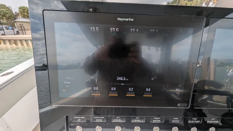 Slide: The Image of Raymarine display on 2021 Vela 368 Center Console boat, showing navigation data. - 21