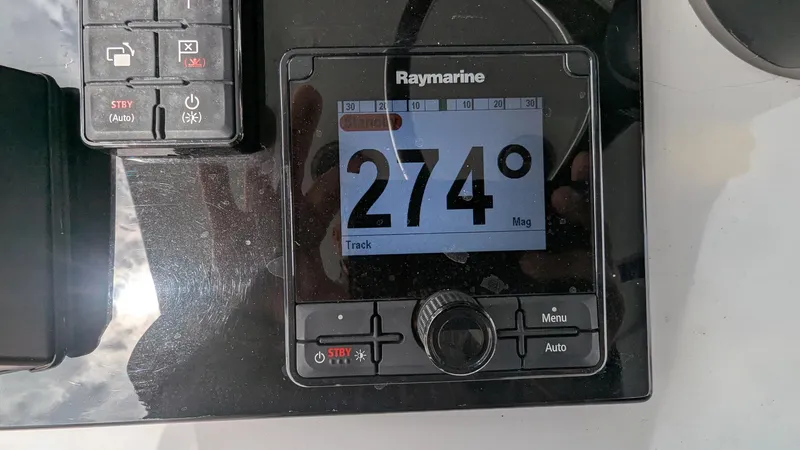 Slide: The Image of Raymarine navigation display showing 274 degrees on Vela 368 Center Console, 2021 model. - 23