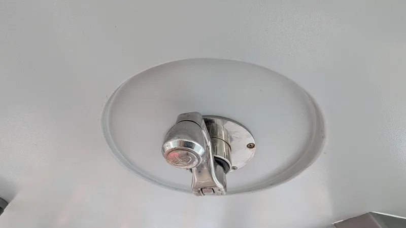 Slide: The Image of Ceiling-mounted light fixture on 2021 Vela 368 Center Console boat. - 28