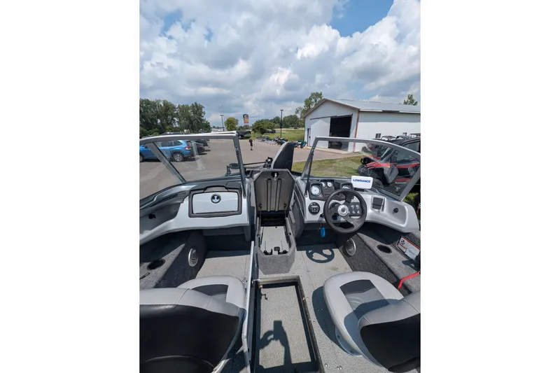 Slide: The Image of 2019 Tracker Pro Guide V-175 Combo boat interior with steering wheel and dashboard. - 7
