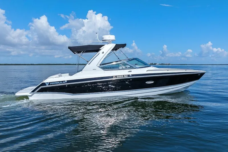 Slide: The Image of 2007 Formula 280 Bowrider cruising on calm waters under a clear blue sky. - 0