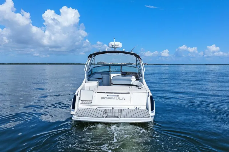Slide: The Image of 2007 Formula 280 Bowrider cruising on calm blue waters under a clear sky. - 18