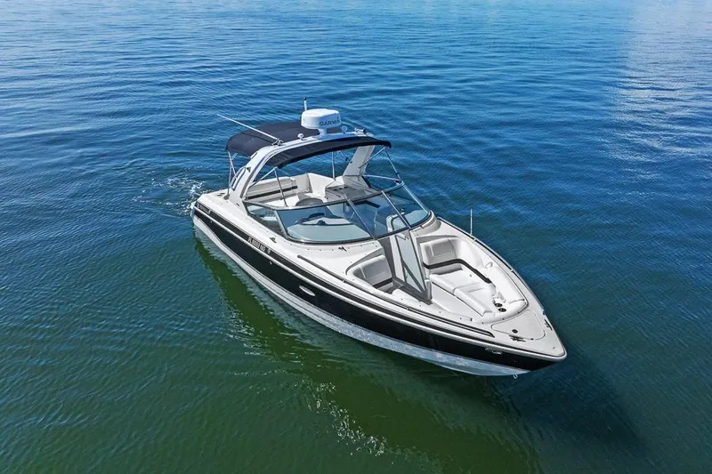Slide: The Image of 2007 Formula 280 Bowrider boat cruising on calm blue water. - 20