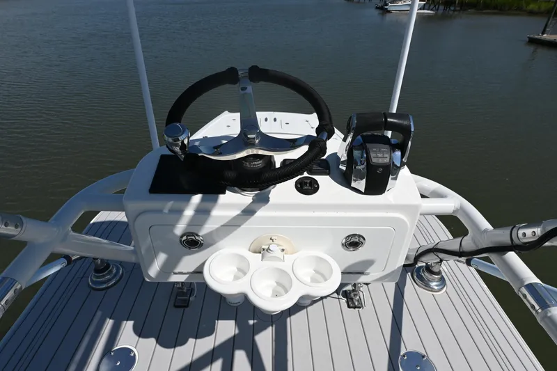 Slide: The Image of Helm of 2021 Freeman 37VH boat with steering wheel and controls on deck. - 20