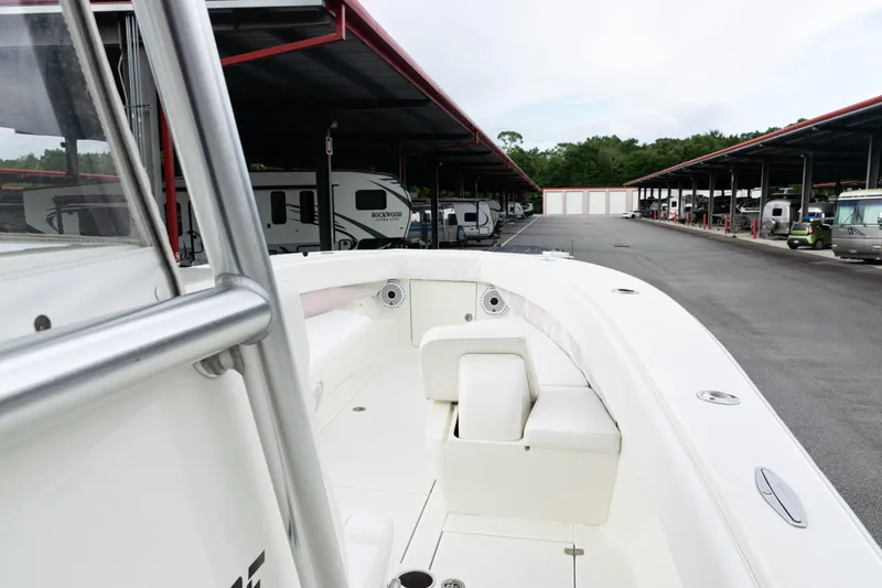 Slide: The Image of 2017 SeaVee 340Z boat docked near RV storage area. - 11