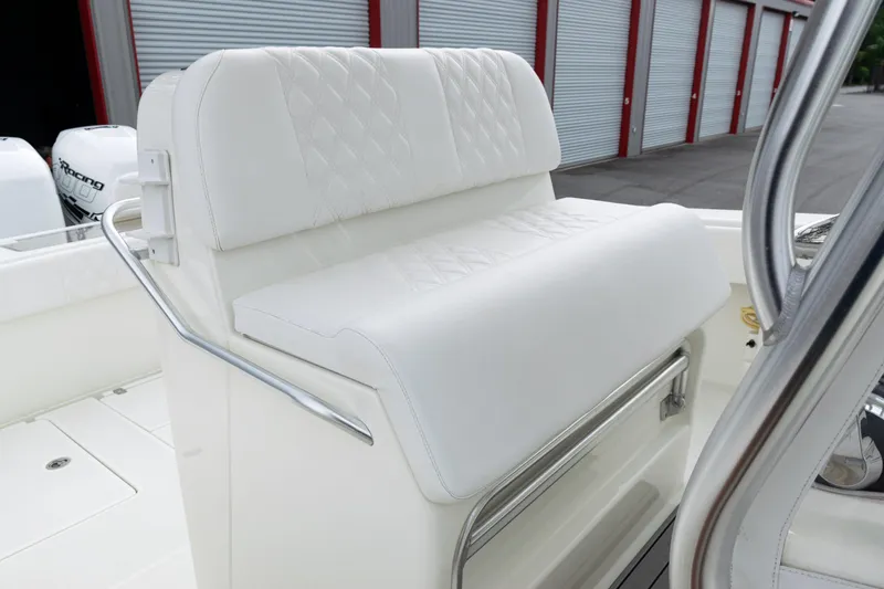 Slide: The Image of 2017 SeaVee 340Z boat with white cushioned seating and stainless steel railing. - 33