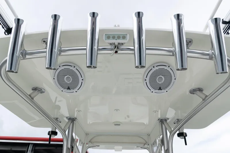 Slide: The Image of 2017 SeaVee 340Z boat with rod holders and speakers on the T-top. - 35