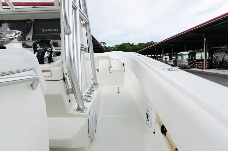 Slide: The Image of 2017 SeaVee 340Z boat interior with Garmin navigation, docked near RVs. - 36
