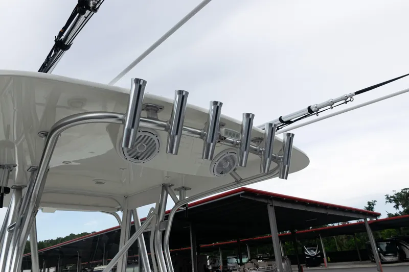 Slide: The Image of 2017 SeaVee 340Z boat with rod holders and speakers on the T-top. - 40