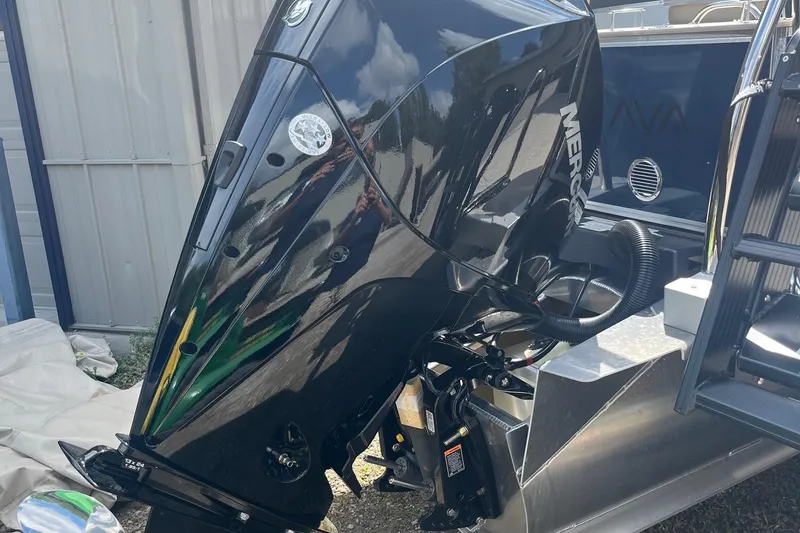 Slide: The Image of 2026 Avalon 23 LSZ Quad Lounger with powerful Mercury outboard motor. - 8