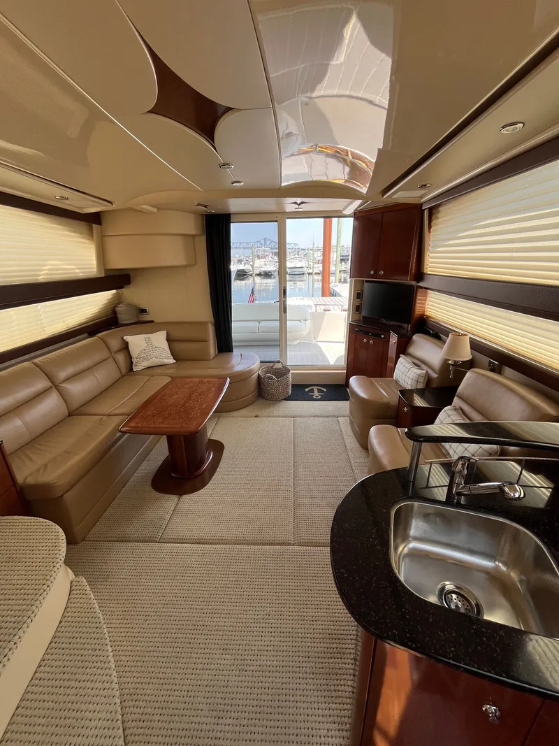 Slide: The Image of Luxurious interior of a 2008 Meridian 391 Sedan yacht with leather seating and kitchenette. - 18