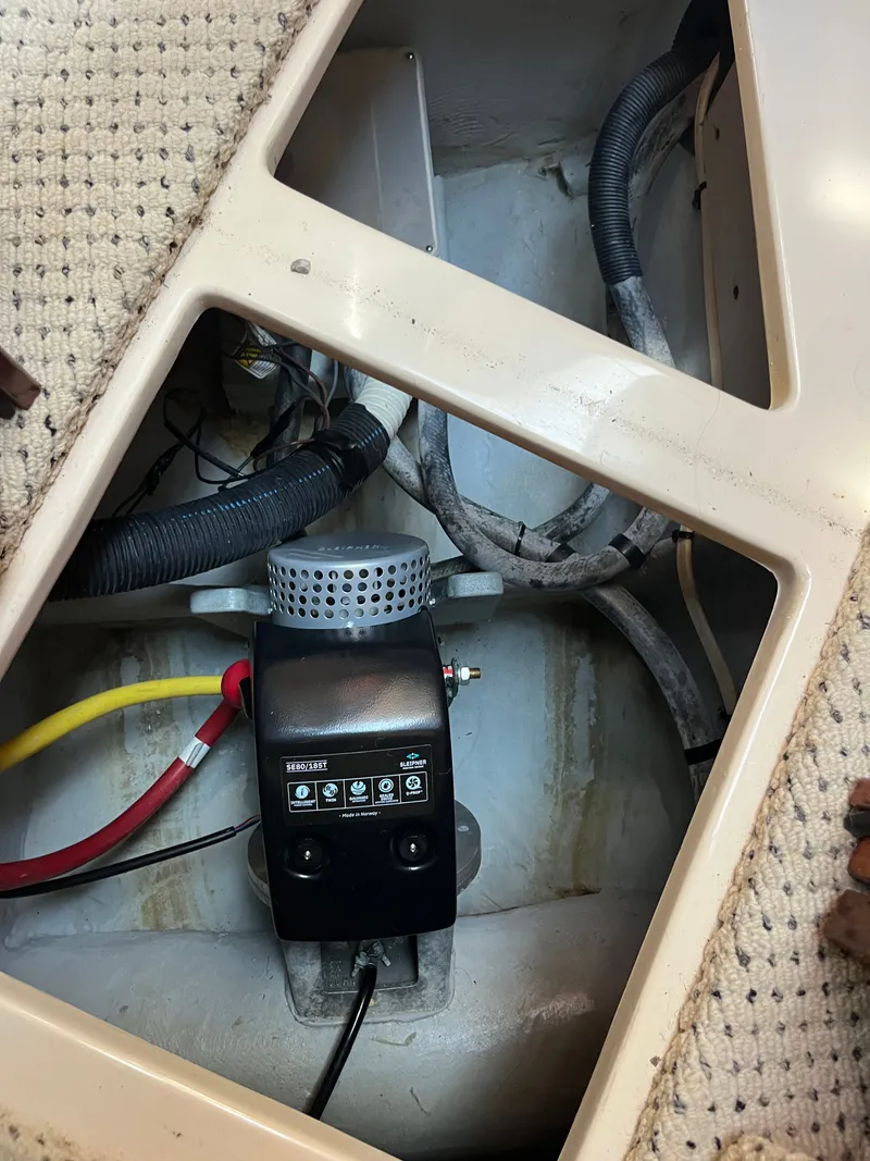 Slide: The Image of 2008 Meridian 391 Sedan engine compartment with wiring and equipment. - 31