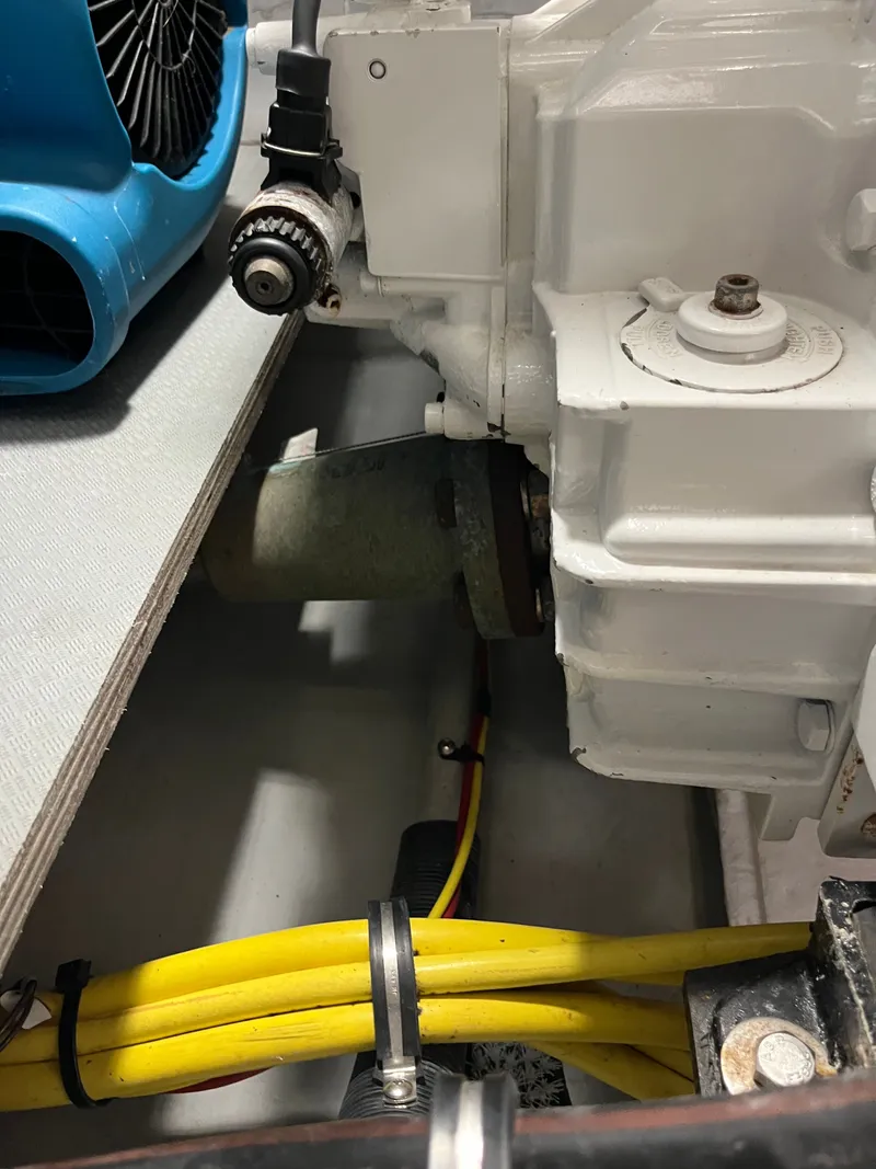 Slide: The Image of Engine compartment of a 2008 Meridian 391 Sedan with visible wiring and components. - 37