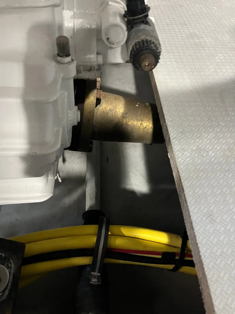 Slide: The Image of Engine compartment of a 2008 Meridian 391 Sedan with visible components and wiring. - 38