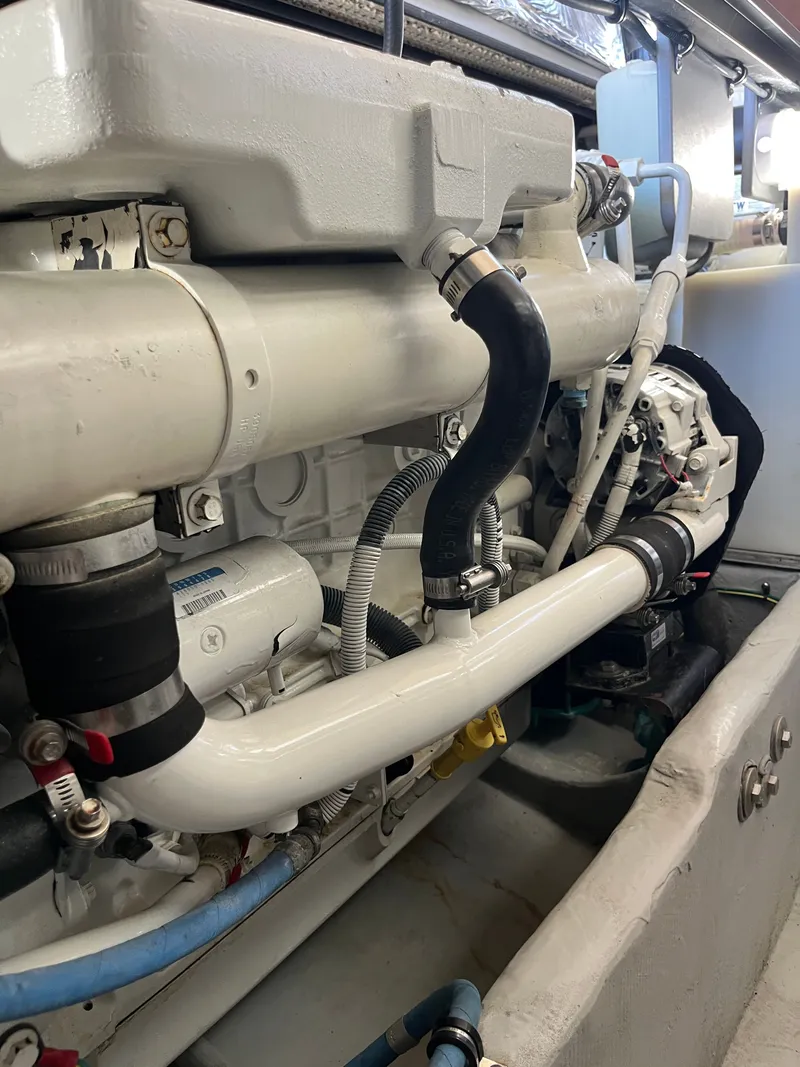 Slide: The Image of Engine compartment of a 2008 Meridian 391 Sedan, showcasing pipes and mechanical components. - 39