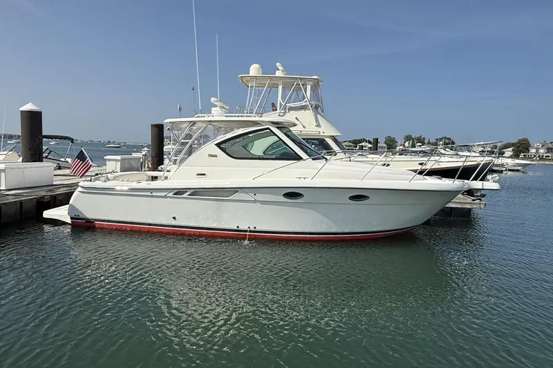 Slide: The Image of 2008 Tiara Yachts 3000 Open docked in a marina, side view. - 1