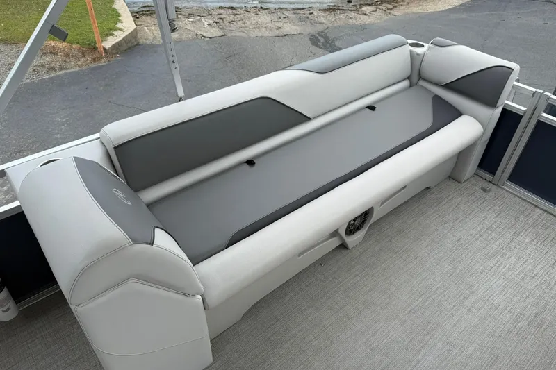 Slide: The Image of 2024 Avalon VENTURE 85 QUAD LOUNGER boat interior with sleek, modern seating design. - 13