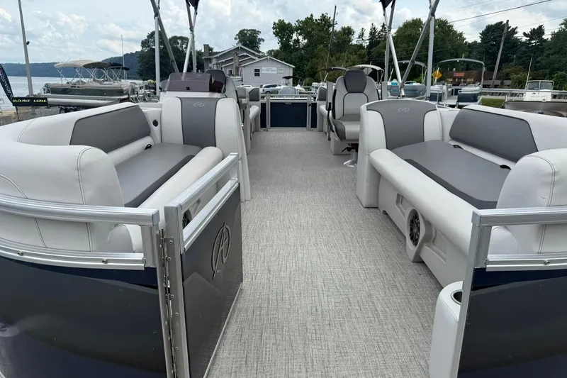 Slide: The Image of 2024 Avalon VENTURE 85 QUAD LOUNGER pontoon boat with spacious seating and modern design. - 7