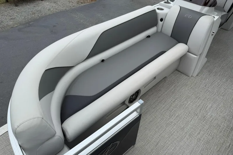 Slide: The Image of 2024 Avalon VENTURE 85 QUAD LOUNGER boat interior with sleek, modern seating design. - 9