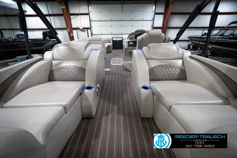 Slide: The Image of Luxurious interior of 2016 Bennington 2375 GCW pontoon boat with plush seating. - 17