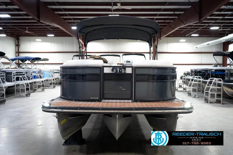 Slide: The Image of 2016 Bennington 2375 GCW pontoon boat in showroom, front view. - 3