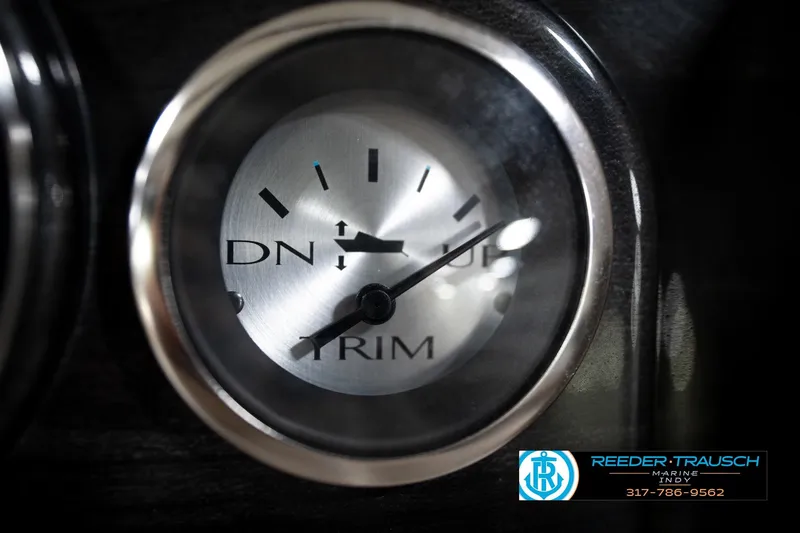 Slide: The Image of Close-up of 2016 Bennington 2375 GCW trim gauge with Reeder-Trausch Marine logo. - 36