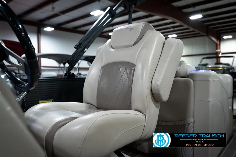 Slide: The Image of Luxurious seating in 2016 Bennington 2375 GCW pontoon boat, showcased indoors. - 41