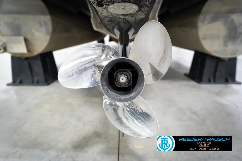 Slide: The Image of 2016 Bennington 2375 GCW boat propeller close-up in a showroom setting. - 54