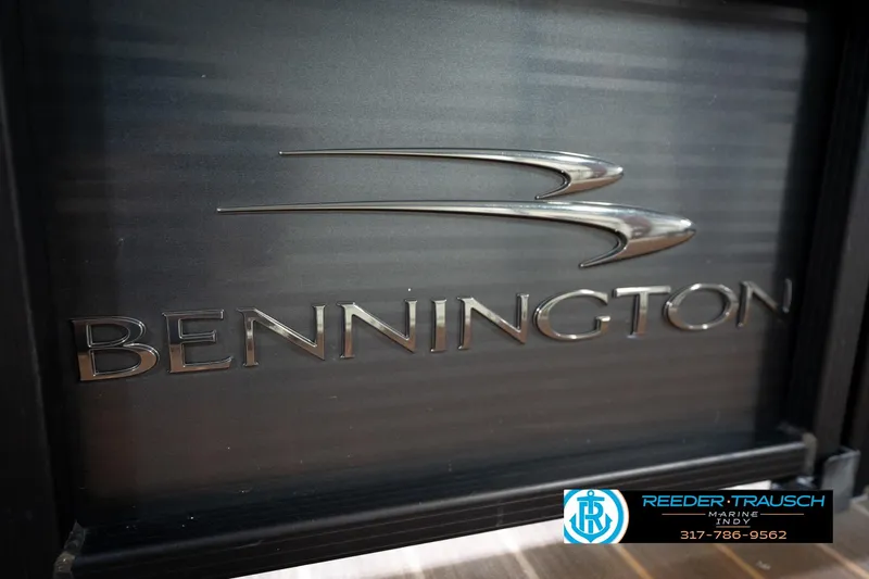 Slide: The Image of 2016 Bennington 2375 GCW logo on a dark background with dealership contact details. - 55