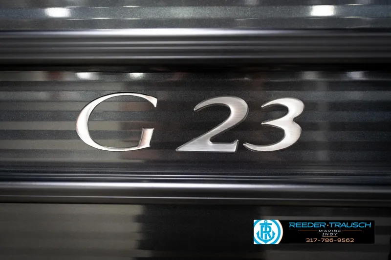Slide: The Image of Close-up of 2016 Bennington 2375 GCW boat model number G23 with dealership logo. - 57
