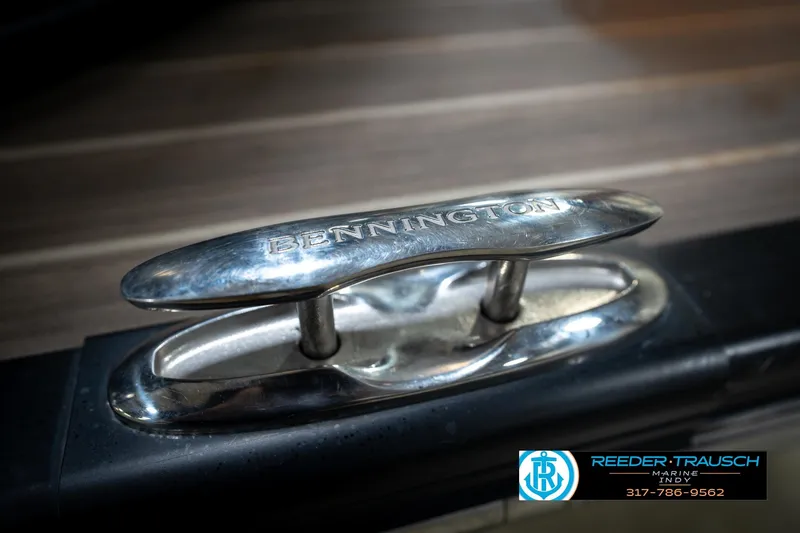 Slide: The Image of Close-up of a 2016 Bennington 2375 GCW boat cleat with engraved logo. - 60