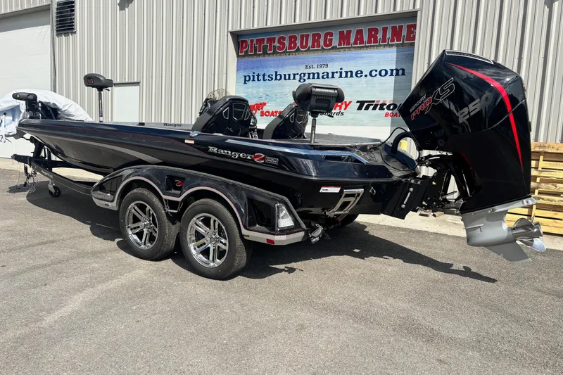 Slide: The Image of 2025 Ranger Z520R boat with powerful engine, parked outside Pittsburg Marine. - 16