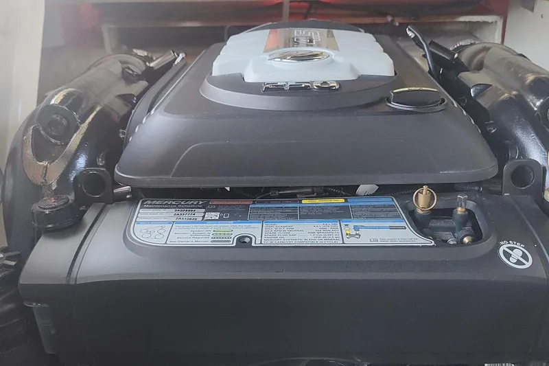 Slide: The Image of Engine of a 2017 Sea Ray SLX 230 boat, featuring Mercury components. - 10