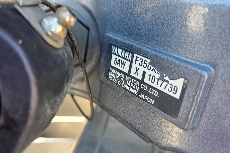 Slide: The Image of Close-up of Yamaha motor label on 2019 Bennington Q 25 QCW boat. - 11