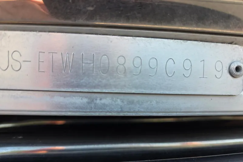 Slide: The Image of 2019 Bennington Q 25 QCW hull identification number plate. - 12