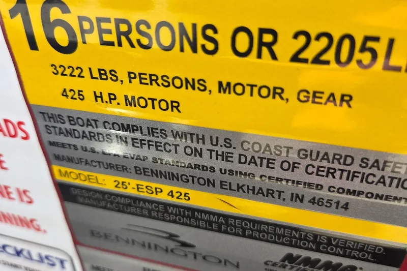 Slide: The Image of 2019 Bennington Q 25 QCW boat label, 16-person capacity, 425 HP motor, safety compliance. - 13