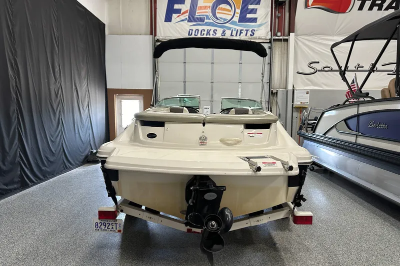 Slide: The Image of 2007 Sea Ray 185 Bow Rider boat in showroom, rear view. - 4