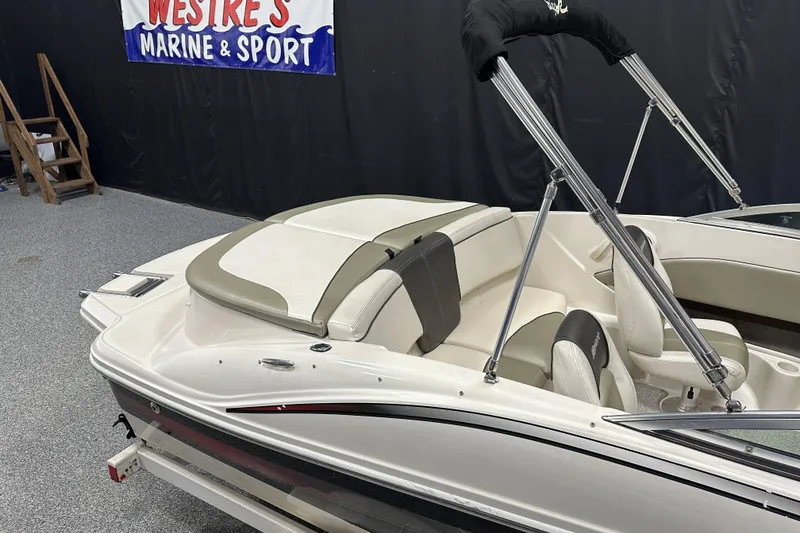 Slide: The Image of 2007 Sea Ray 185 Bow Rider boat interior at Westre's Marine & Sport showroom. - 7
