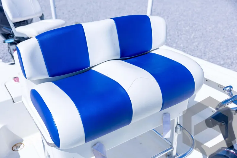 Slide: The Image of Blue and white seat on 2008 Triton 240 LTS boat. - 49