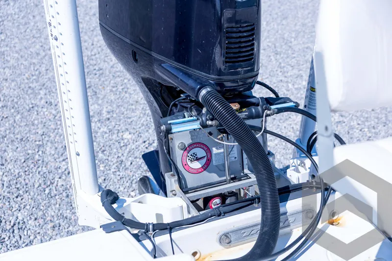 Slide: The Image of 2008 Triton 240 LTS boat engine close-up with visible components and wiring. - 61