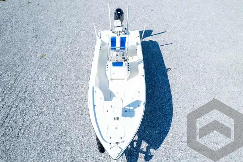 Slide: The Image of Aerial view of 2008 Triton 240 LTS boat on gravel surface. - 69