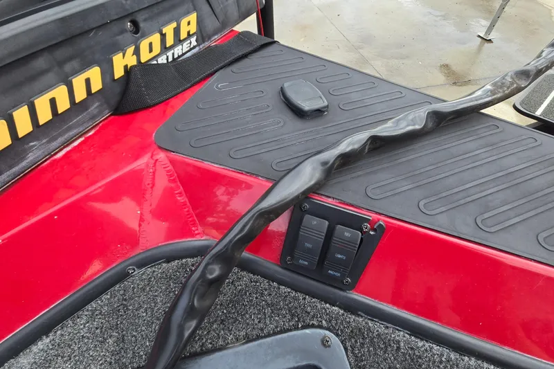 Slide: The Image of Red 2013 Ranger RT188 boat deck with Minn Kota trolling motor controls. - 29