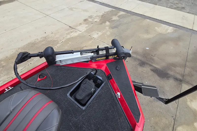 Slide: The Image of 2013 Ranger RT188 boat with trolling motor and foot pedal on red deck. - 30