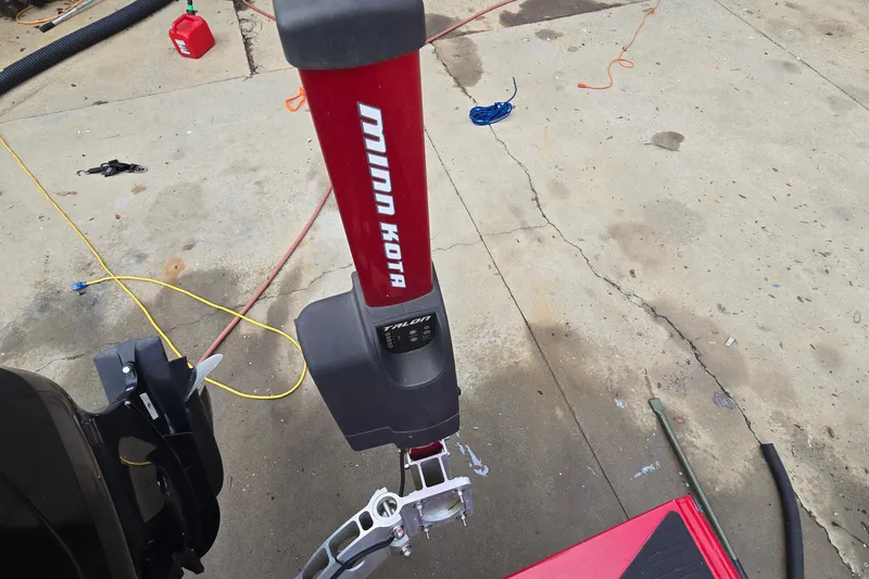 Slide: The Image of Minn Kota Talon anchor on 2013 Ranger RT188 boat, concrete background. - 31