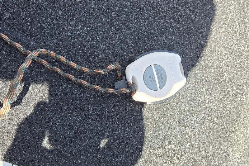 Slide: The Image of Remote control with "Up" and "Down" buttons on a textured surface, Ranger RT188, 2013. - 32