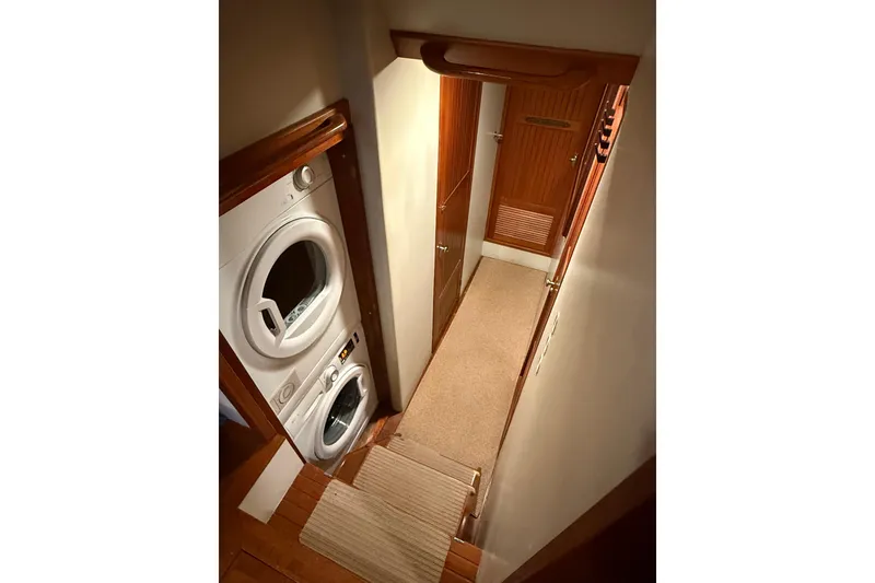 Slide: The Image of Laundry area in 1994 Kadey-Krogen Krogen 42 yacht with stacked washer and dryer. - 21